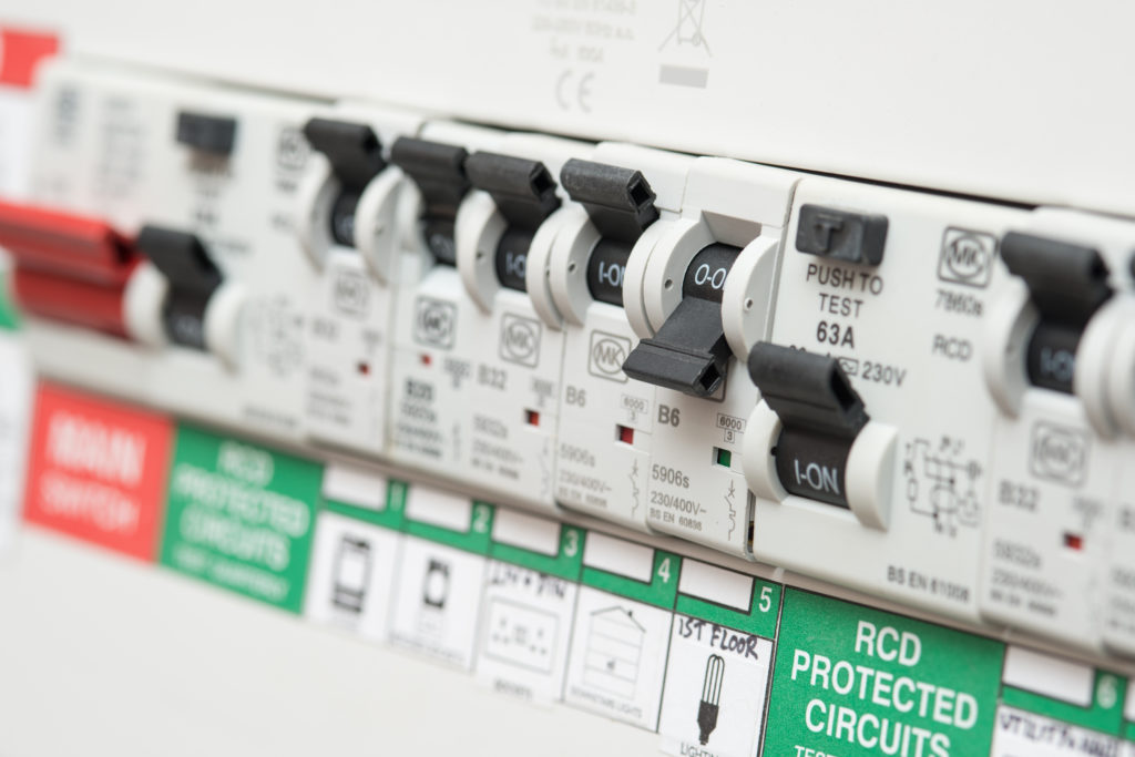 An RCD circuit breaker board displays many switches.