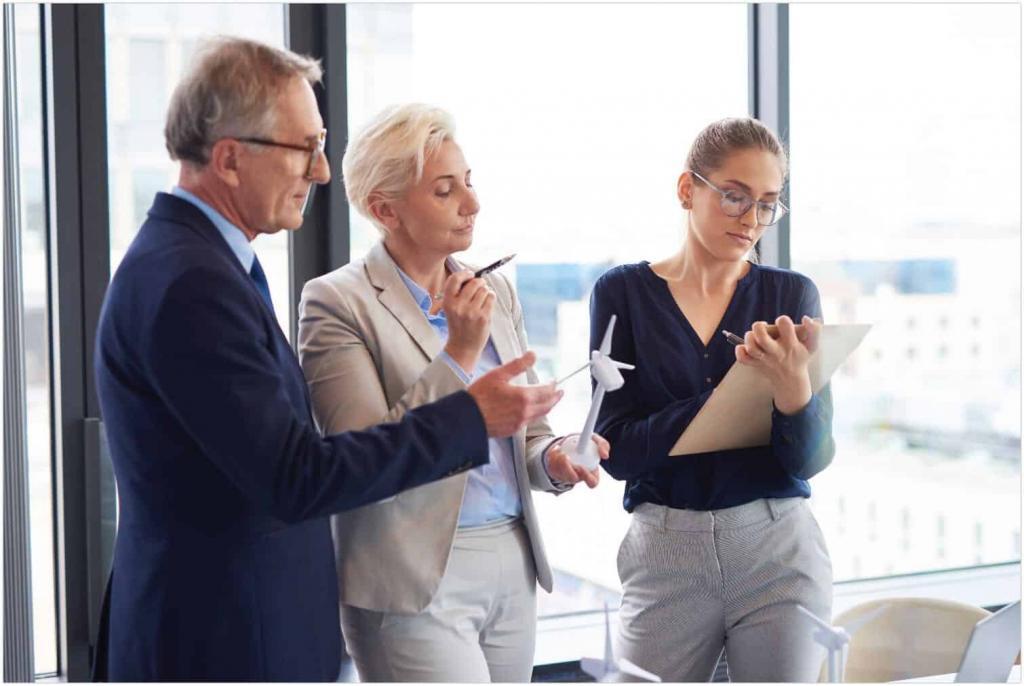 Business workers having a conversation about renewable energy